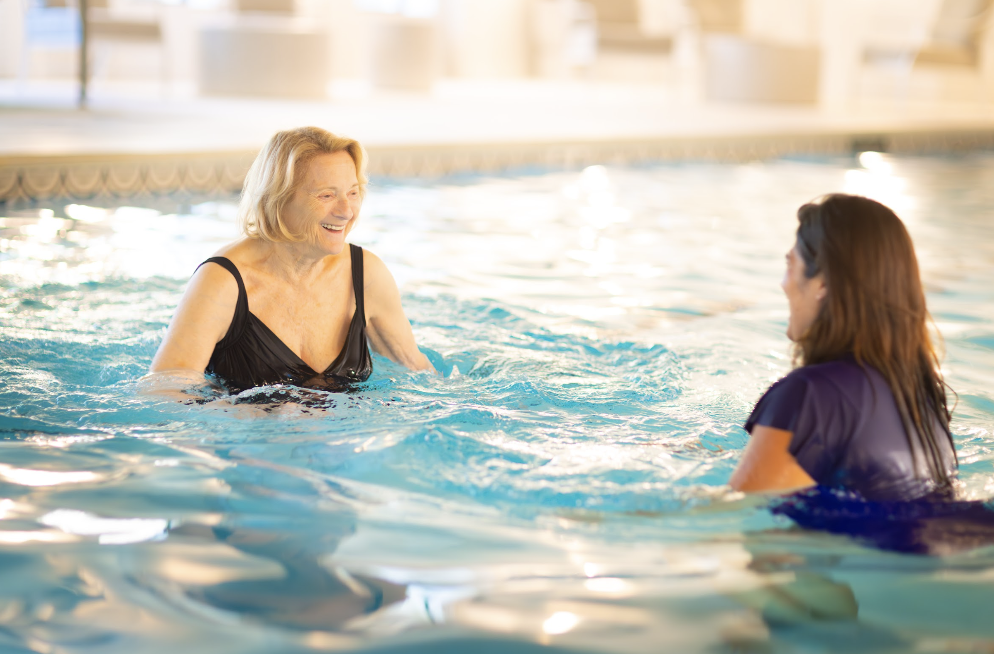 Senior citizen doing aqua therapy.