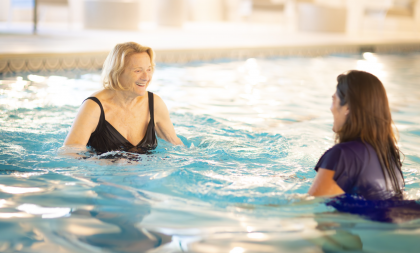 Senior citizen doing aqua therapy.